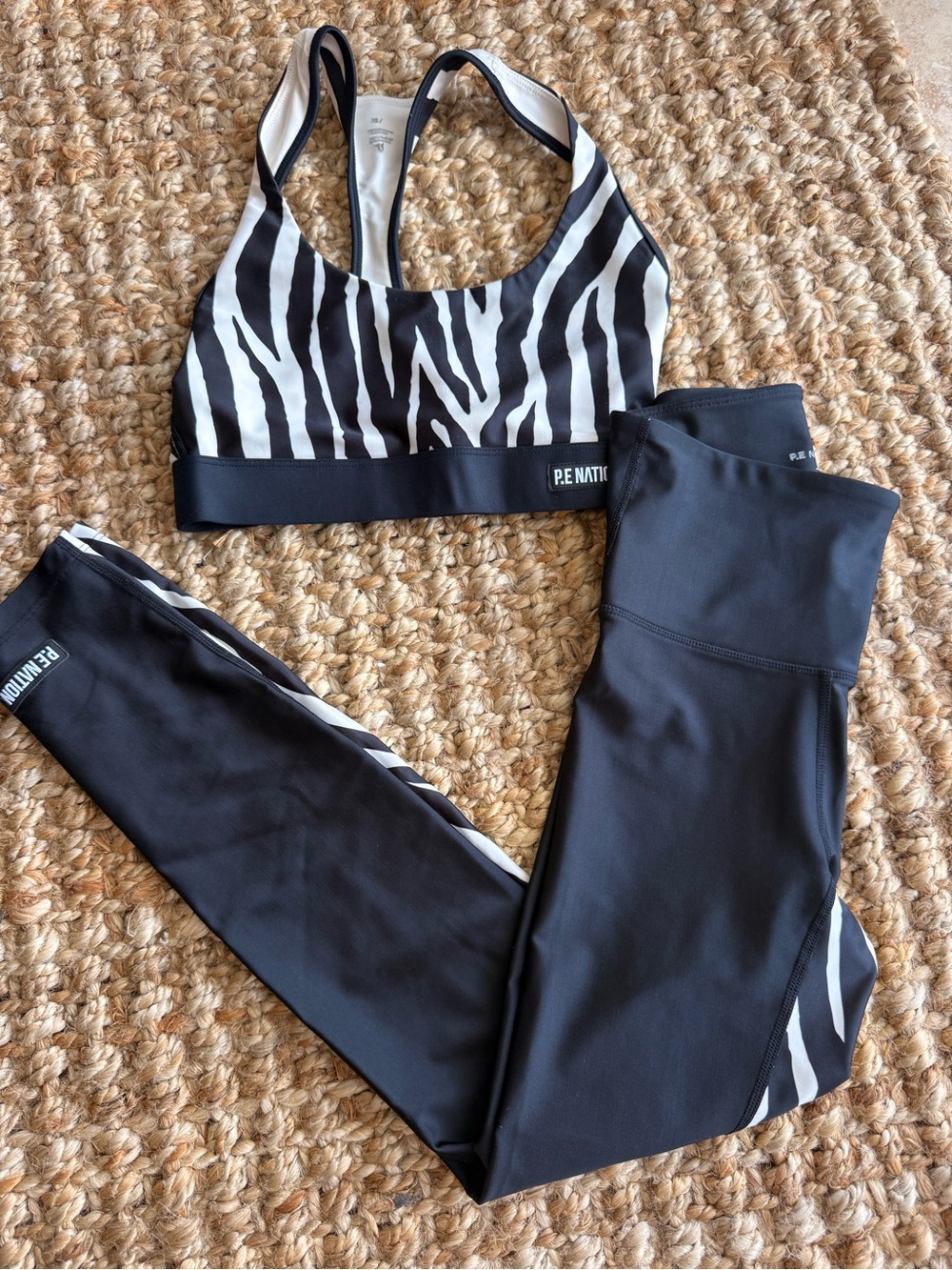 P.E Nation Black & White Zebra Sports Bra with Black Leggings
